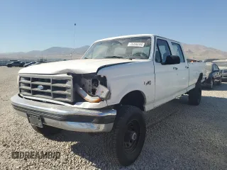 1994 Ford F-350 with VIN 1FTJW36H2REA16900, listed as a Copart auction lot 75356244 with 236,265 mi miles and Salvage title. Bid and sale history available at DreamBid. Image 1.
