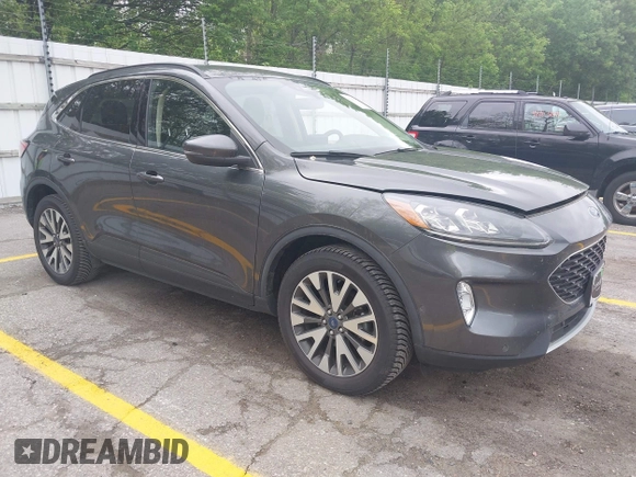 2020 Ford Escape Titanium with VIN 1FMCU9J96LUA00564, listed as a IAAI auction lot 42261152 with 73,748 mi miles and . Bid and sale history available at DreamBid. Image 1.