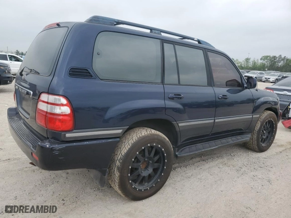 2003 Toyota Land Cruiser with VIN JTEHT05J332050634, listed as a Copart auction lot 51154885 with 352,568 mi miles and Clean Title. Bid and sale history available at carsss.com. Image 2.