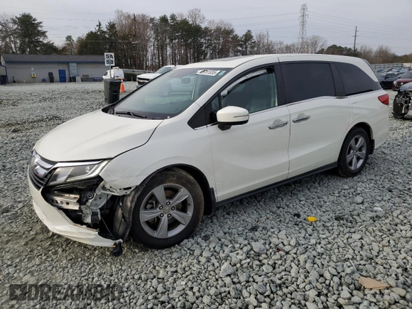 2019 Honda Odyssey EX-L with VIN 5FNRL6H72KB014960, listed as a Copart auction lot 48701035 with 131,921 mi miles and Salvage Title. Bid and sale history available at carsss.com. Image 1.