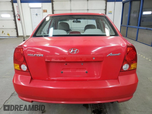 2004 Hyundai Accent GL with VIN KMHCG45C94U538368, listed as a Copart auction lot 42444565 with 163,028 mi miles and Salvage Title. Bid and sale history available at carsss.com. Image 6.