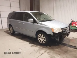 2013 Chrysler Town & Country Touring with VIN 2C4RC1BG8DR689862, listed as a IAAI auction lot 41082531 with 181,447 mi miles. Bid and sale history available at carsss.com. Image 1.