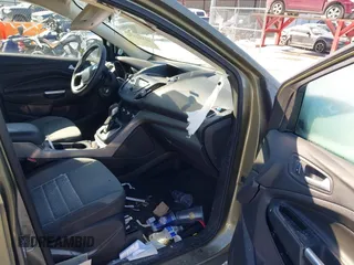 2013 Ford Escape SE with VIN 1FMCU0GX4DUC60741, listed as a IAAI auction lot 41592770 with 121,972 mi miles and . Bid and sale history available at DreamBid. Image 5.