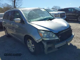 2005 Honda Odyssey EX-L with VIN 5FNRL38645B134981, listed as a IAAI auction lot 41847669 with 153,864 mi miles. Bid and sale history available at carsss.com. Image 1.