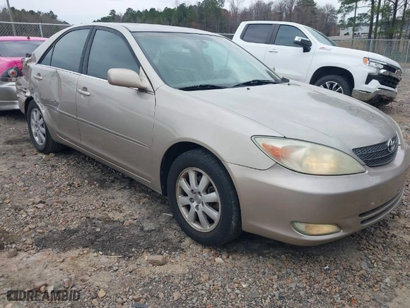 2004 Toyota Camry LE with VIN 4T1BF30K74U585891, listed as a IAAI auction lot 41750734 with 193,602 mi miles. Bid and sale history available at carsss.com. Image 1.