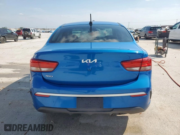 2023 Kia Rio LX z VIN 3KPA24AD2PE597810, wystawiony jako Copart lot #53565235 z przebiegiem 6 836 mil mil oraz Szkoda całkowita • Salvage title. Historia ofert i sprzedaży dostępna na DreamBid. Obrazek 6.