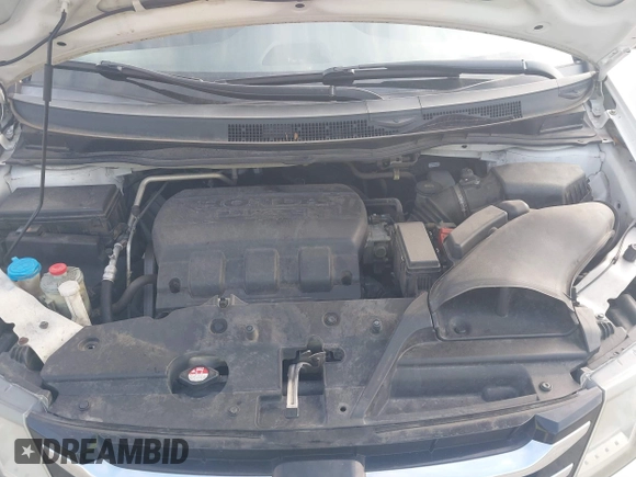 2014 Honda Odyssey Touring with VIN 5FNRL5H97EB127836, listed as a IAAI auction lot 41497413 with 174,914 mi miles and . Bid and sale history available at DreamBid. Image 10.