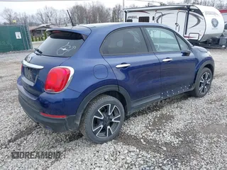 2016 FIAT 500X Easy z VIN ZFBCFXBT3GP386641, wystawiony jako IAAI lot #41946706 z przebiegiem 133 908 mil mil oraz . Historia ofert i sprzedaży dostępna na DreamBid. Obrazek 4.