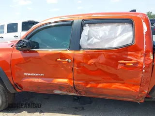 2017 Toyota Tacoma SR5 with VIN 5TFCZ5AN4HX091383, listed as a IAAI auction lot 42202505 with 82,000 mi miles and . Bid and sale history available at DreamBid. Image 14.