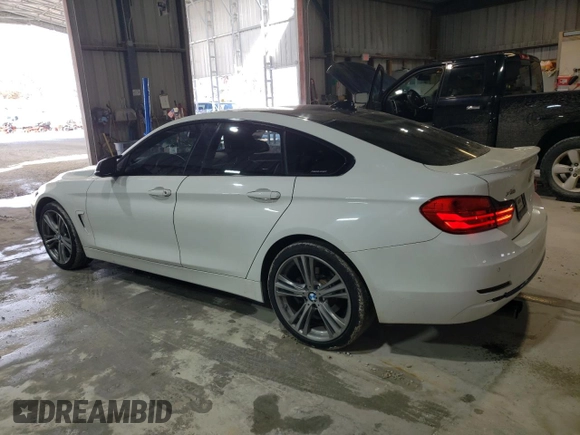 2016 BMW 4 Series 428i xDrive with VIN WBA4C9C55GG137762, listed as a Copart auction lot 46083245 with 100,591 mi miles and Salvage Title. Bid and sale history available at DreamBid. Image 2.