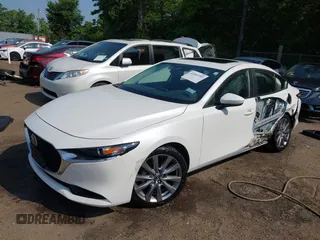 2022 Mazda 3 Carbon Edition with VIN 3MZBPACL0NM318573, listed as a IAAI auction lot 42403393 with 8,762 mi miles and . Bid and sale history available at DreamBid. Image 18.