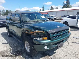 1999 Dodge Durango with VIN 1B4HS28Z3XF521133, listed as a IAAI auction lot 42068475 with 229,651 mi miles. Bid and sale history available at carsss.com. Image 6.