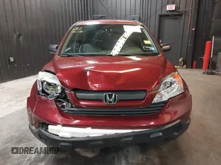 2009 Honda CR-V LX with VIN JHLRE48339C018957, listed as a IAAI auction lot 41952951 with 76,502 mi miles. Bid and sale history available at carsss.com. Image 12.