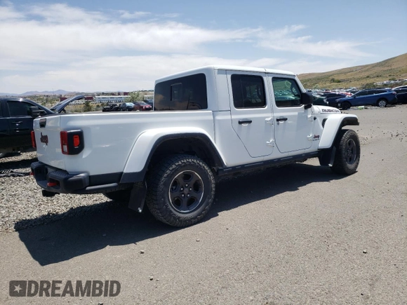 2022 Jeep Gladiator Rubicon z VIN 1C6JJTBG4NL135430, wystawiony jako Copart lot #52581015 z przebiegiem 54 553 mil mil oraz Szkoda całkowita • Salvage title. Historia ofert i sprzedaży dostępna na DreamBid. Obrazek 3.