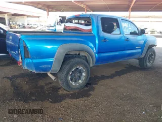 2009 Toyota Tacoma PreRunner with VIN 3TMJU62N69M072481, listed as a IAAI auction lot 41425389 with 212,723 mi miles. Bid and sale history available at carsss.com. Image 4.