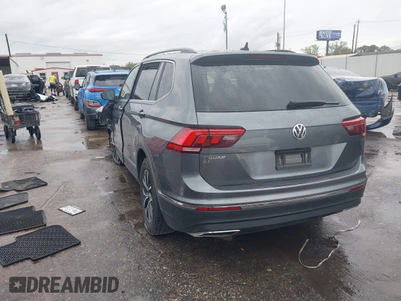 2020 Volkswagen Tiguan SE with VIN 3VV3B7AX0LM121061, listed as a IAAI auction lot 41881541 with 60,315 mi miles and . Bid and sale history available at DreamBid. Image 3.