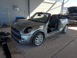 2019 MINI Convertible Cooper S with VIN WMWWG9C54K3E40225, listed as a Copart auction lot 42201665 with 56,749 mi miles and Salvage Title. Bid and sale history available at carsss.com. Image 1.