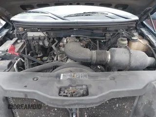 2005 Ford F-150 STX with VIN 1FTRX12W65FA56345, listed as a IAAI auction lot 41723884 with 251,594 mi miles. Bid and sale history available at carsss.com. Image 10.