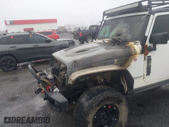 2016 Jeep Wrangler Unlimited Rubicon with VIN 1C4BJWFGXGL185227, listed as a IAAI auction lot 41555159 with 1 mi miles. Bid and sale history available at carsss.com. Image 16.