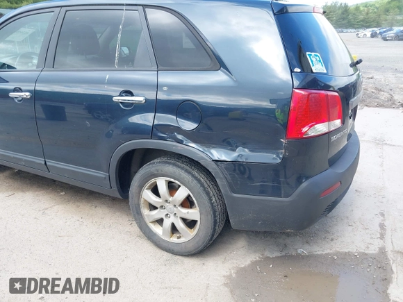 2013 Kia Sorento LX with VIN 5XYKTCA60DG403769, listed as a IAAI auction lot 42265980 with 215,013 mi miles and . Bid and sale history available at DreamBid. Image 6.