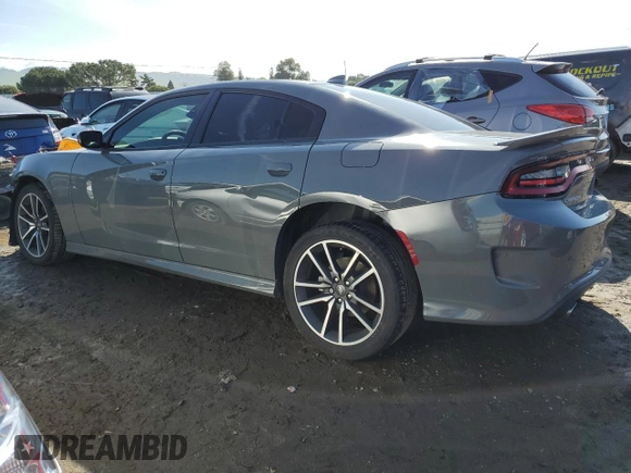 2023 Dodge Charger GT with VIN 2C3CDXHG0PH670993, listed as a Copart auction lot 48915405 with 7,740 mi miles and Salvage Title. Bid and sale history available at DreamBid. Image 2.