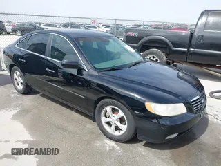 2006 Hyundai Azera SE with VIN KMHFC46F06A113482, listed as a IAAI auction lot 41733834 with 242,159 mi miles and . Bid and sale history available at DreamBid. Image 1.