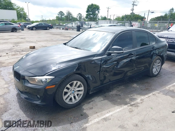 2014 BMW 3 Series 320i with VIN WBA3B1G52ENS80039, listed as a IAAI auction lot 42253717 with 104,388 mi miles and . Bid and sale history available at DreamBid. Image 2.