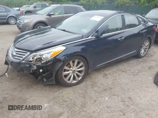 2013 Hyundai Azera with VIN KMHFH4JG5DA260461, listed as a IAAI auction lot 42603483 with 157,362 mi miles and . Bid and sale history available at DreamBid. Image 23.