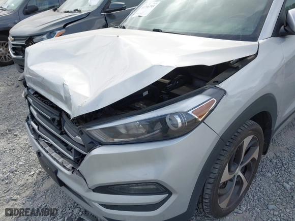 2018 Hyundai Tucson Value with VIN KM8J3CA21JU816783, listed as a IAAI auction lot 41716795 with 84,580 mi miles. Bid and sale history available at carsss.com. Image 6.