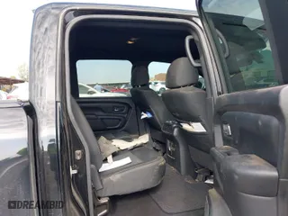 2018 Nissan Titan SV with VIN 1N6AA1E64JN529022, listed as a IAAI auction lot 41127756 with 150,166 mi miles. Bid and sale history available at carsss.com. Image 8.