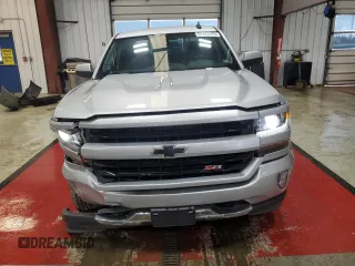 2018 Chevrolet Silverado 1500 LT with VIN 3GCUKREC8JG588990, listed as a Copart auction lot 51463175 with 101,602 mi miles and Salvage Title. Bid and sale history available at carsss.com. Image 5.