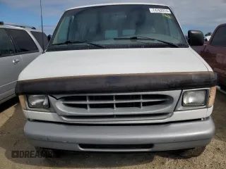 2000 Ford Econoline Passenger XL with VIN 1FBSS31L1YHB80264, listed as a Copart auction lot 74762814 with 61,702 mi miles and Salvage Title. Bid and sale history available at DreamBid. Image 5.