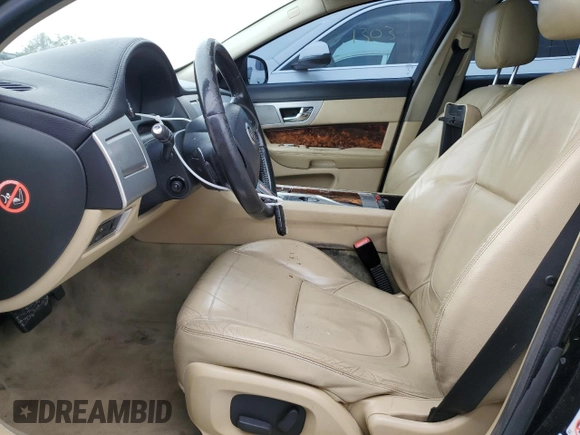 2013 Jaguar XF I4 RWD with VIN SAJWA0ES9DPS98337, listed as a Copart auction lot 88045425 with 144,928 mi miles and Salvage Title. Bid and sale history available at carsss.com. Image 7.
