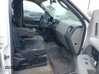 2004 Ford F-150 XLT with VIN 1FTPW12534KD74981, listed as a IAAI auction lot 42086802 with 323,592 mi miles. Bid and sale history available at carsss.com. Image 5.