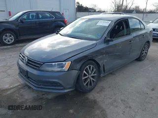 2016 Volkswagen Jetta Sedan 1.4T SE with VIN 3VWD67AJ7GM281671, listed as a IAAI auction lot 41385896 with 153,168 mi miles. Bid and sale history available at carsss.com. Image 17.