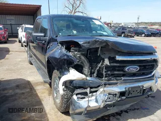 2021 Ford F-150 XL with VIN 1FTFW1E86MFB31305, listed as a IAAI auction lot 41877501 with 140,285 mi miles and . Bid and sale history available at DreamBid. Image 1.