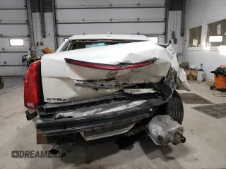 2013 Cadillac CTS Premium z VIN 1G6DS5E3XD0101681, wystawiony jako Copart lot #41334385 z przebiegiem 49 646 mil mil oraz Szkoda całkowita • Salvage title. Historia ofert i sprzedaży dostępna na DreamBid. Obrazek 6.