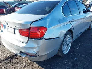 2014 BMW 3 Series 335i xDrive with VIN WBA3B9G55ENR90731, listed as a IAAI auction lot 41807046 with 45,752 mi miles and . Bid and sale history available at carsss.com. Image 6.