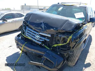 2005 Cadillac Escalade z VIN 1GYEK63N75R134012, wystawiony jako IAAI lot #41821485 z przebiegiem 165 655 mil mil oraz . Historia ofert i sprzedaży dostępna na DreamBid. Obrazek 6.