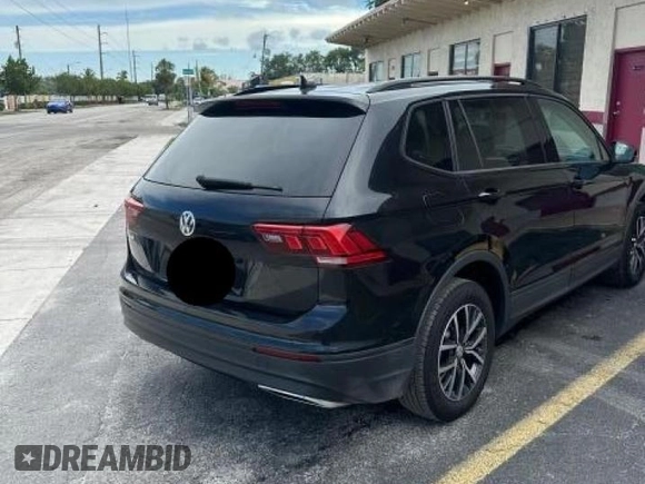 2021 Volkswagen Tiguan S with VIN 3VV1B7AX9MM105997, listed as a Copart auction lot 57079115 with 146,399 mi miles and Clean title. Bid and sale history available at DreamBid. Image 4.