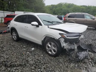 2023 Honda HR-V LX with VIN 3CZRZ2H32PM715175, listed as a Copart auction lot 56970815 with 37,217 mi miles and Salvage title. Bid and sale history available at DreamBid. Image 4.