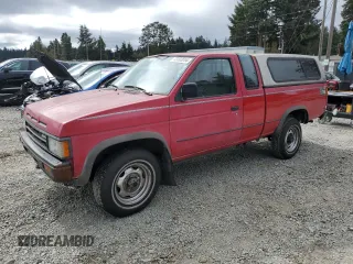 1989 Nissan Hardbody E z VIN 1N6ND16Y9KC352795, wystawiony jako Copart lot #72202814 z przebiegiem 242 396 mil mil oraz Tytuł czysty. Historia ofert i sprzedaży dostępna na DreamBid. Obrazek 1.