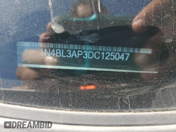 2013 Nissan Altima SL z VIN 1N4BL3AP3DC125047, wystawiony jako Copart lot #52398965 z przebiegiem 213 991 mil mil oraz Szkoda całkowita • Salvage title. Historia ofert i sprzedaży dostępna na DreamBid. Obrazek 13.