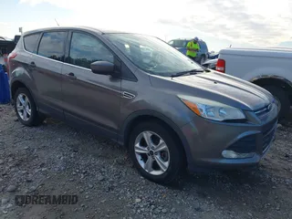 2014 Ford Escape SE with VIN 1FMCU9GX7EUD84797, listed as a IAAI auction lot 41430559 with 157,533 mi miles. Bid and sale history available at carsss.com. Image 1.
