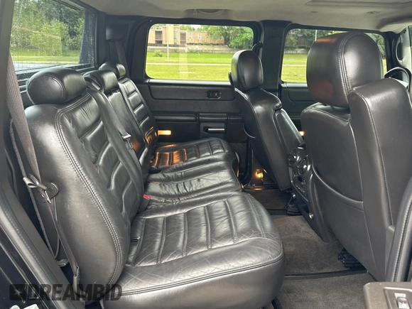 2005 Hummer H2 SUT z VIN 5GRGN22U15H123289, wystawiony jako Copart lot #55254575 z przebiegiem 161 105 mil mil oraz Tytuł czysty. Historia ofert i sprzedaży dostępna na DreamBid. Obrazek 6.