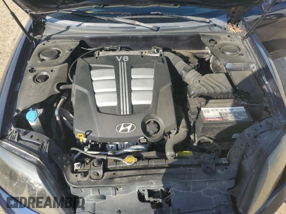 2005 Hyundai Tiburon GT z VIN KMHHN65F85U158764, wystawiony jako Copart lot #80060884 z przebiegiem 121 747 mil mil oraz Czysty tytuł • Clean title. Historia ofert i sprzedaży dostępna na DreamBid. Obrazek 11.