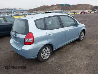 2007 Honda Fit with VIN JHMGD38417S035560, listed as a IAAI auction lot 41960233 with 130,161 mi miles. Bid and sale history available at carsss.com. Image 4.