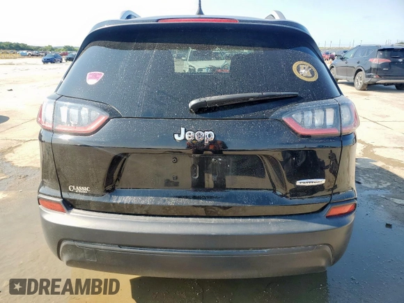 2019 Jeep Cherokee Latitude z VIN 1C4PJLCB7KD332961, wystawiony jako Copart lot #60554635 z przebiegiem 56 024 mil mil oraz Szkoda całkowita • Salvage title. Historia ofert i sprzedaży dostępna na DreamBid. Obrazek 6.