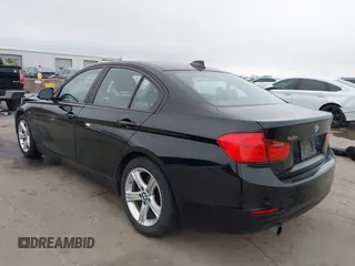 2013 BMW 3 Series 320i with VIN WBA3B1C51DK129473, listed as a IAAI auction lot 41591999 with 80,389 mi miles. Bid and sale history available at carsss.com. Image 3.