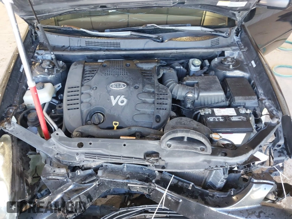 2007 Kia Optima EX with VIN KNAGE124875134352, listed as a IAAI auction lot 41627381 with 183,053 mi miles. Bid and sale history available at carsss.com. Image 10.